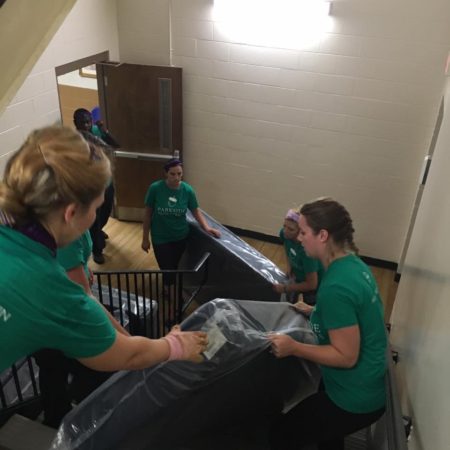Tribe 513 volunteers make a difference at the Greenville Rescue Mission by replacing mattresses.