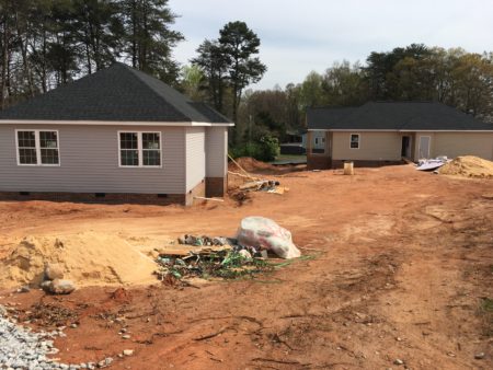 Transitional houses under construction behind Overcomers Center