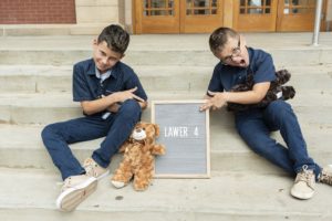 Lawer boys celebrating their adoption