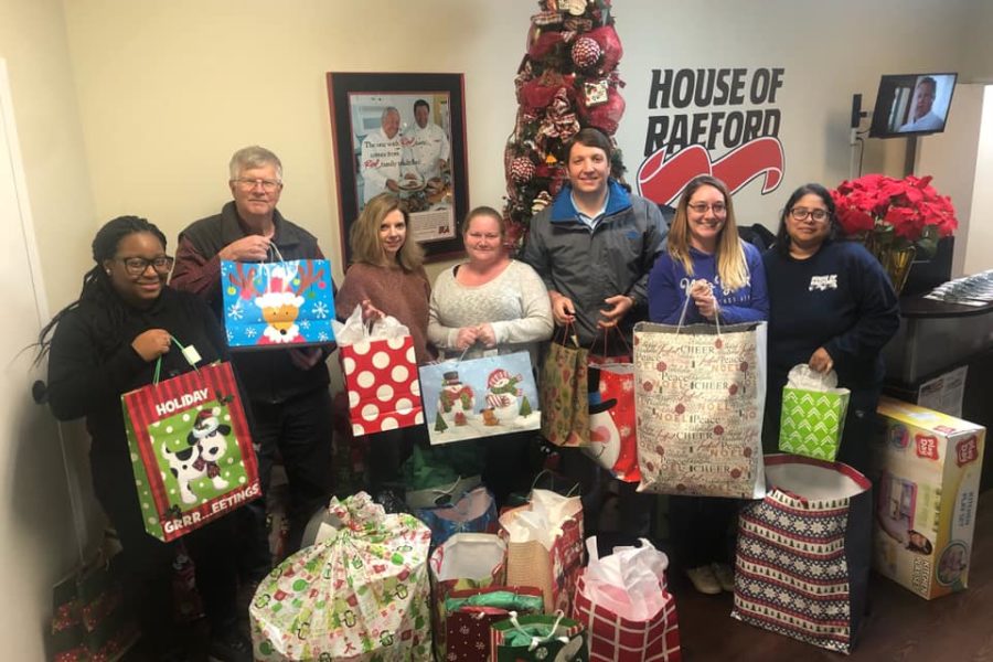 House of Raeford employees provide Christmas gifts for Miracle Hill foster children
